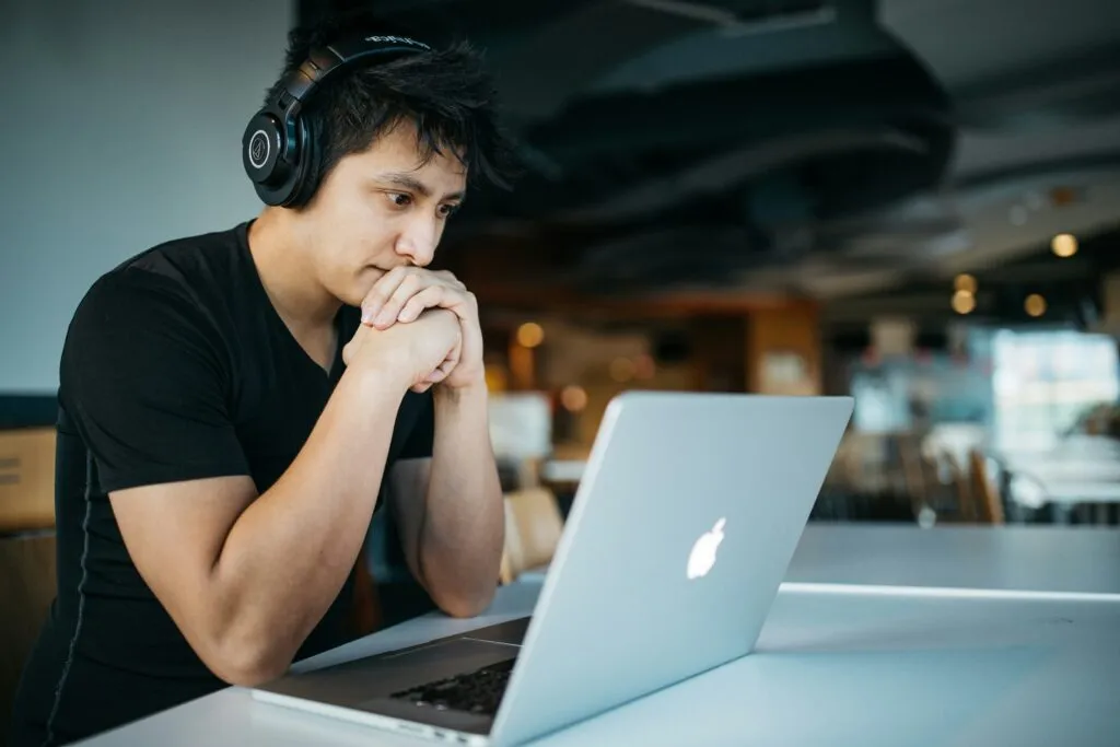 Man Writing Enduring Issues Essay